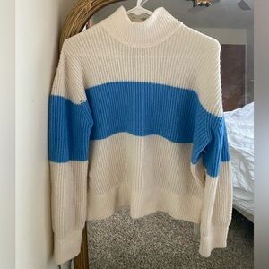 white and blue turtle neck sweater